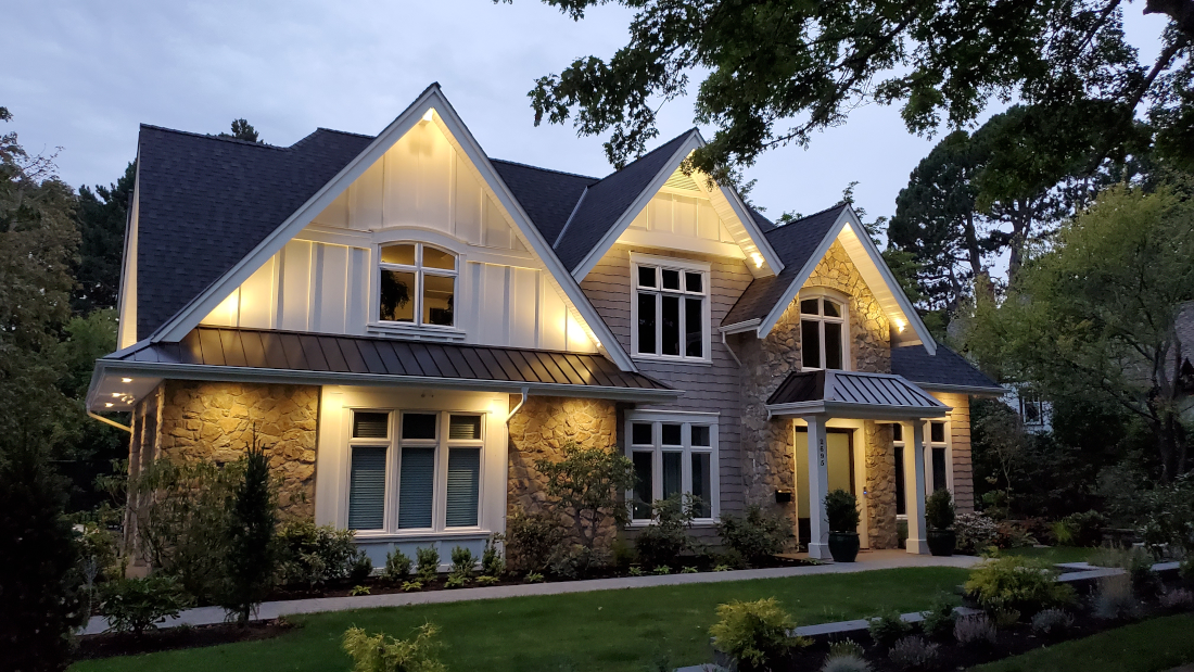 Completed metal roof with landscaping.